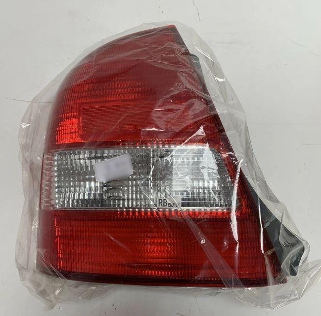 Sep 1998 to May 2002 - Mazda 323 BJ Sedan - Left Taillight - Clear Type, Koito Lens# 220-61866