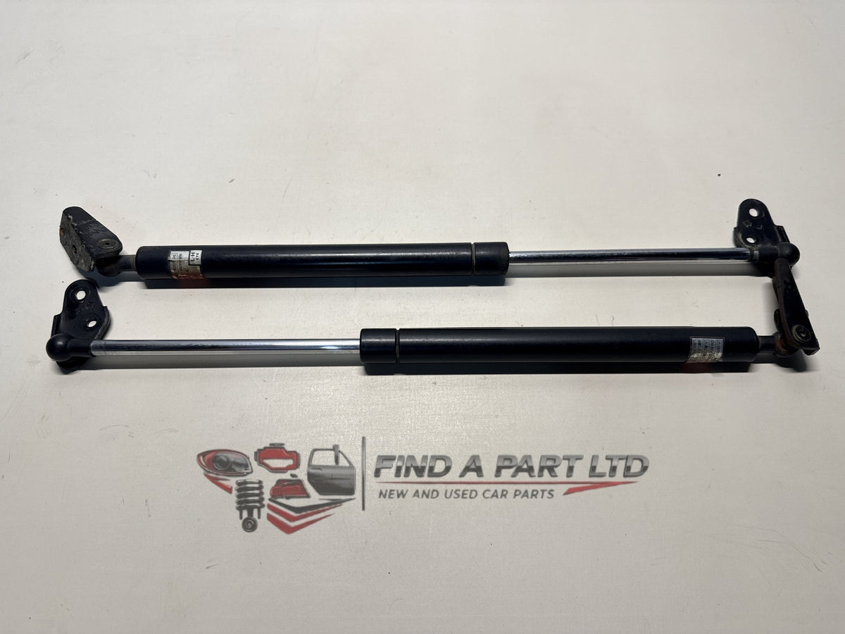 1998 Toyota Caldina T210 - tailgate strut pair PN: 2JL24 T568, 2JL25 T569