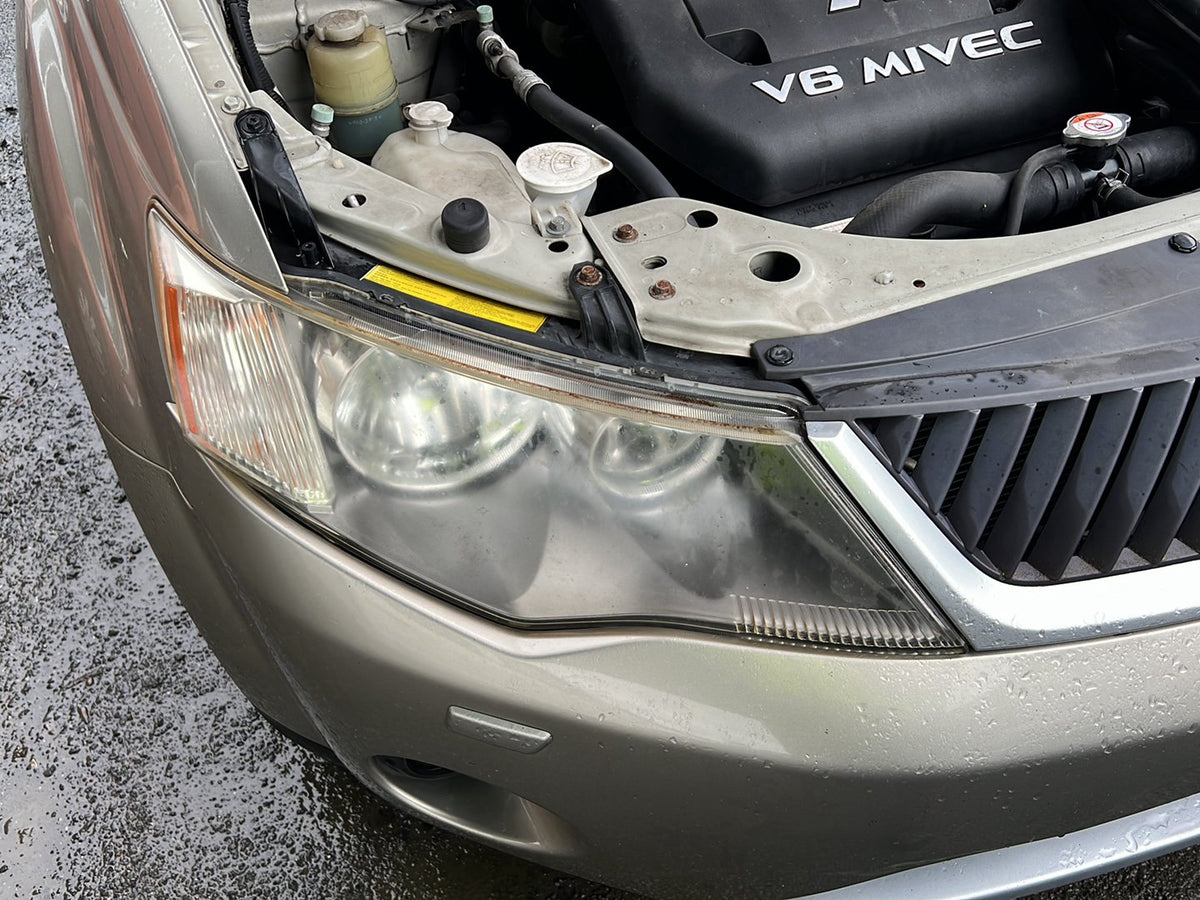 2007 Mitsubishi Outlander JMFXLCW6W7Z000139 - Right Headlight PN: 5585r