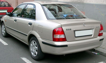 Sep 1998 to May 2002 - Mazda 323 BJ Sedan - Left Taillight - Clear Type, Koito Lens# 220-61866