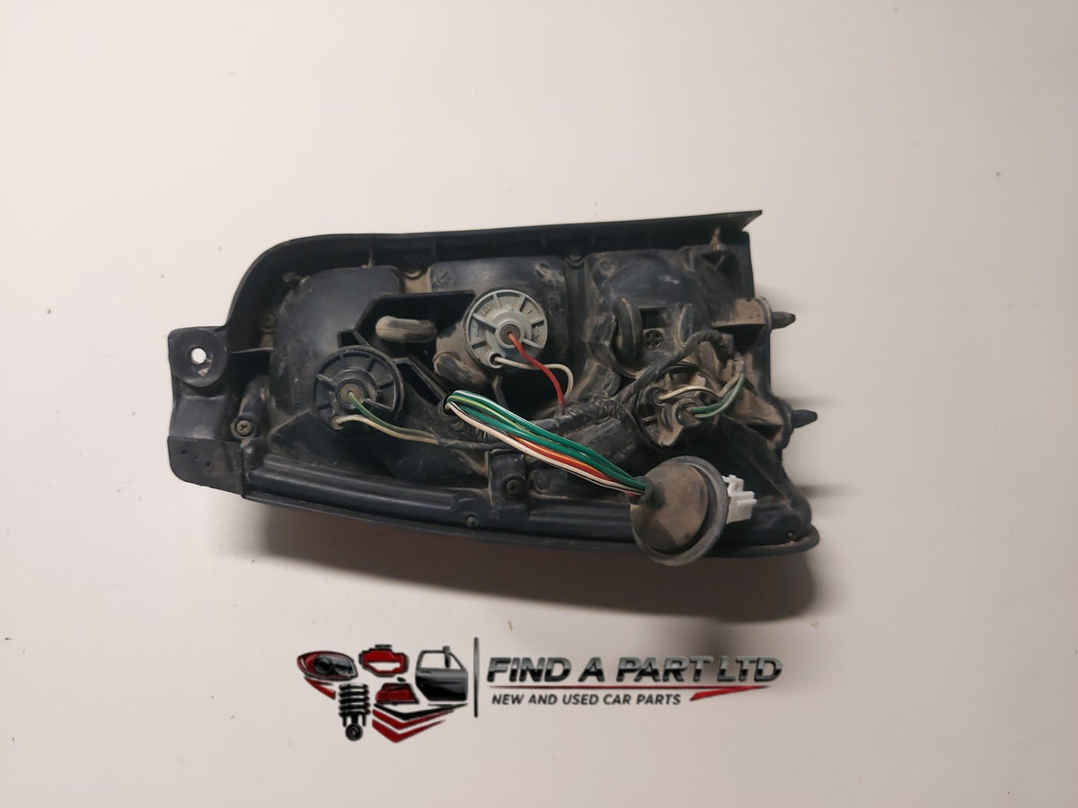 1996 Toyota Corolla E100 - Right Headlight PN: 33-09311