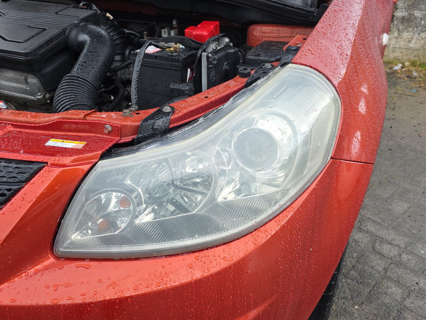 2006-2012 Suzuki SX4 YA11S - Left Headlight PN: Koito 220-59135