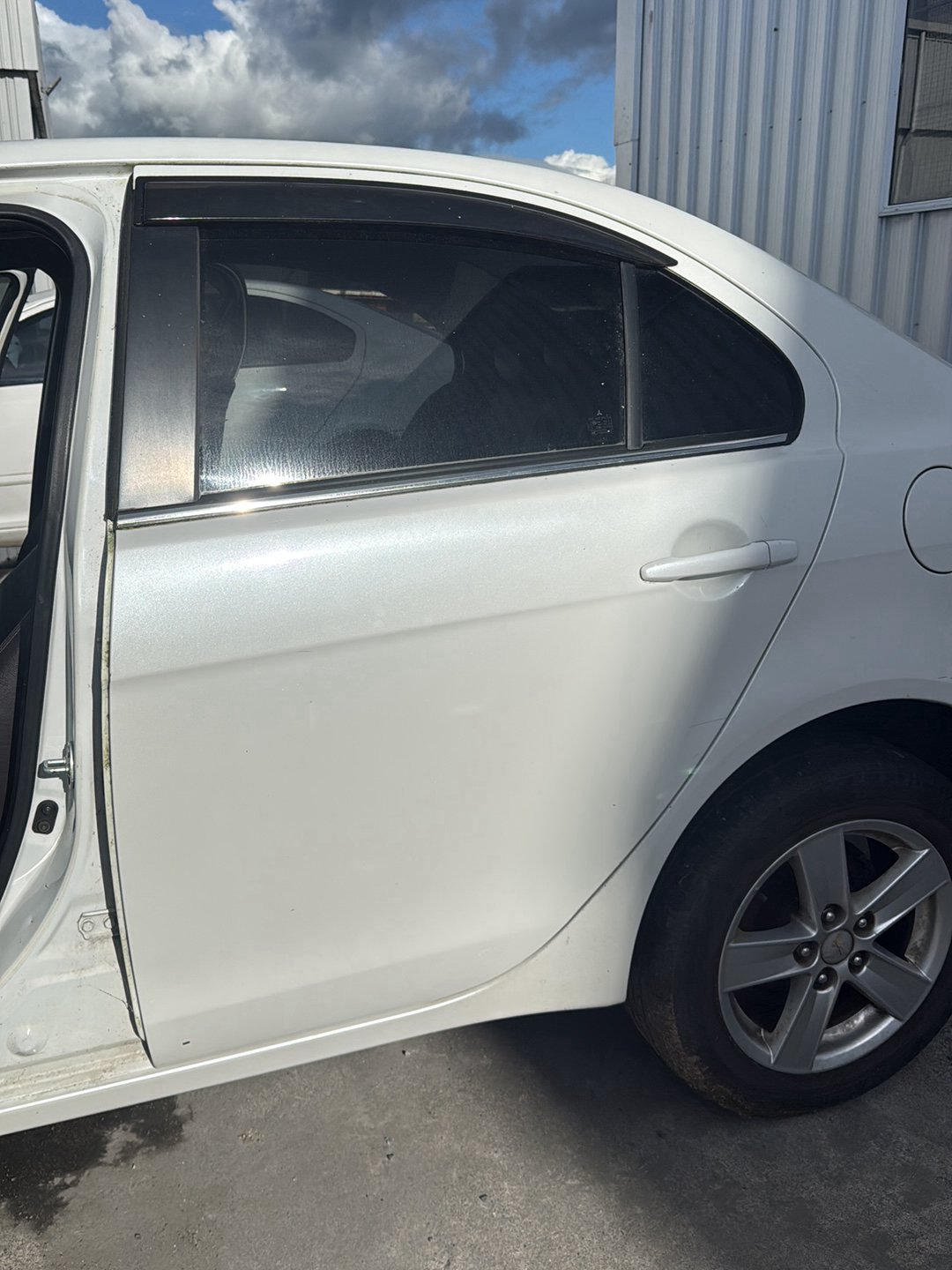 2004-2012 Mitsubishi Galant DJ CY4A - Left Rear Door Shell PN: