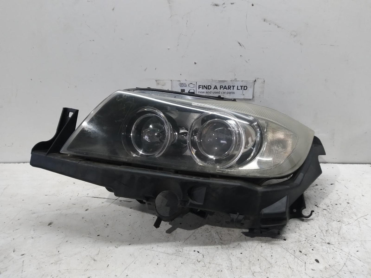 2008 BMW 3 SERIES- Left Headlight PN: