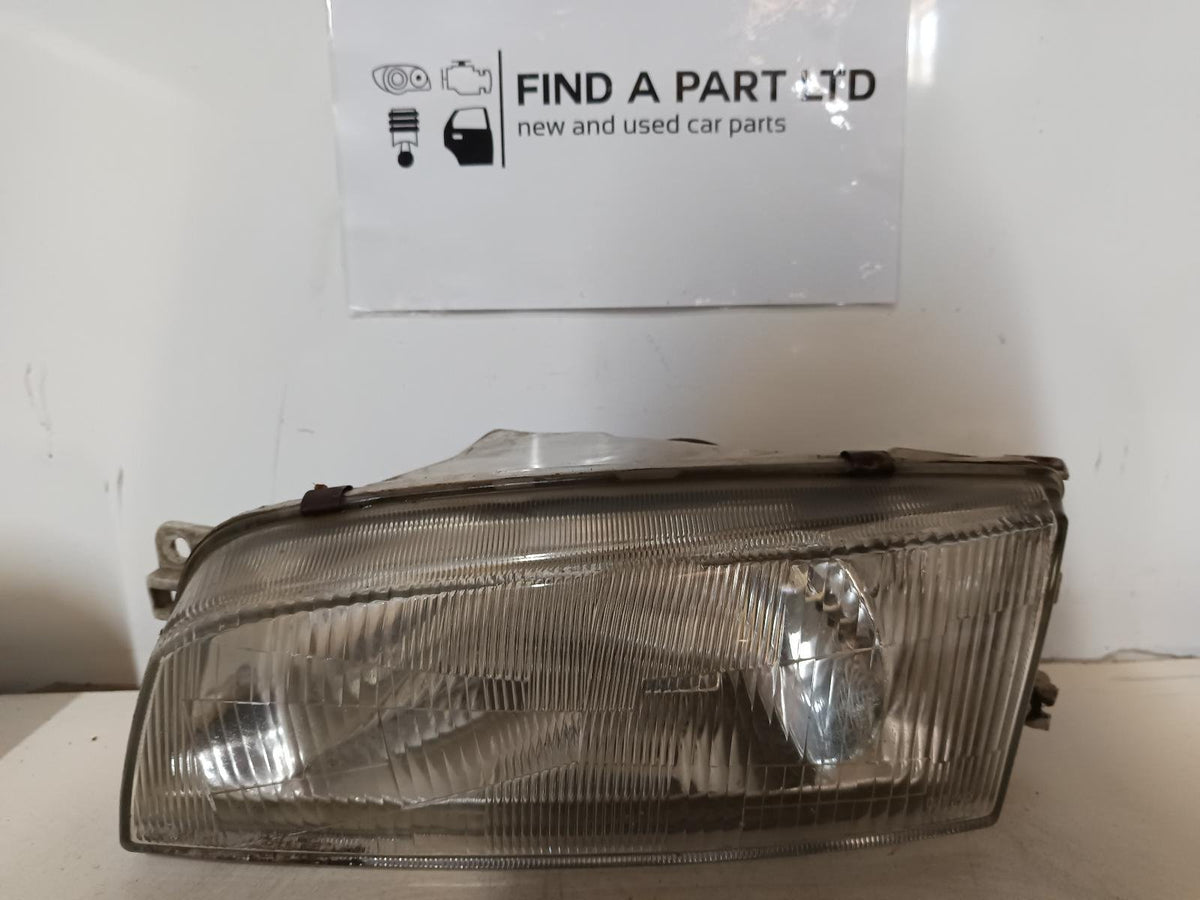 Jul 1996 to Aug 1998- Mitsubishi Lancer/Mirage CE CJ Hatchback Coupe- Left Headlight- (Aust), Glass Type