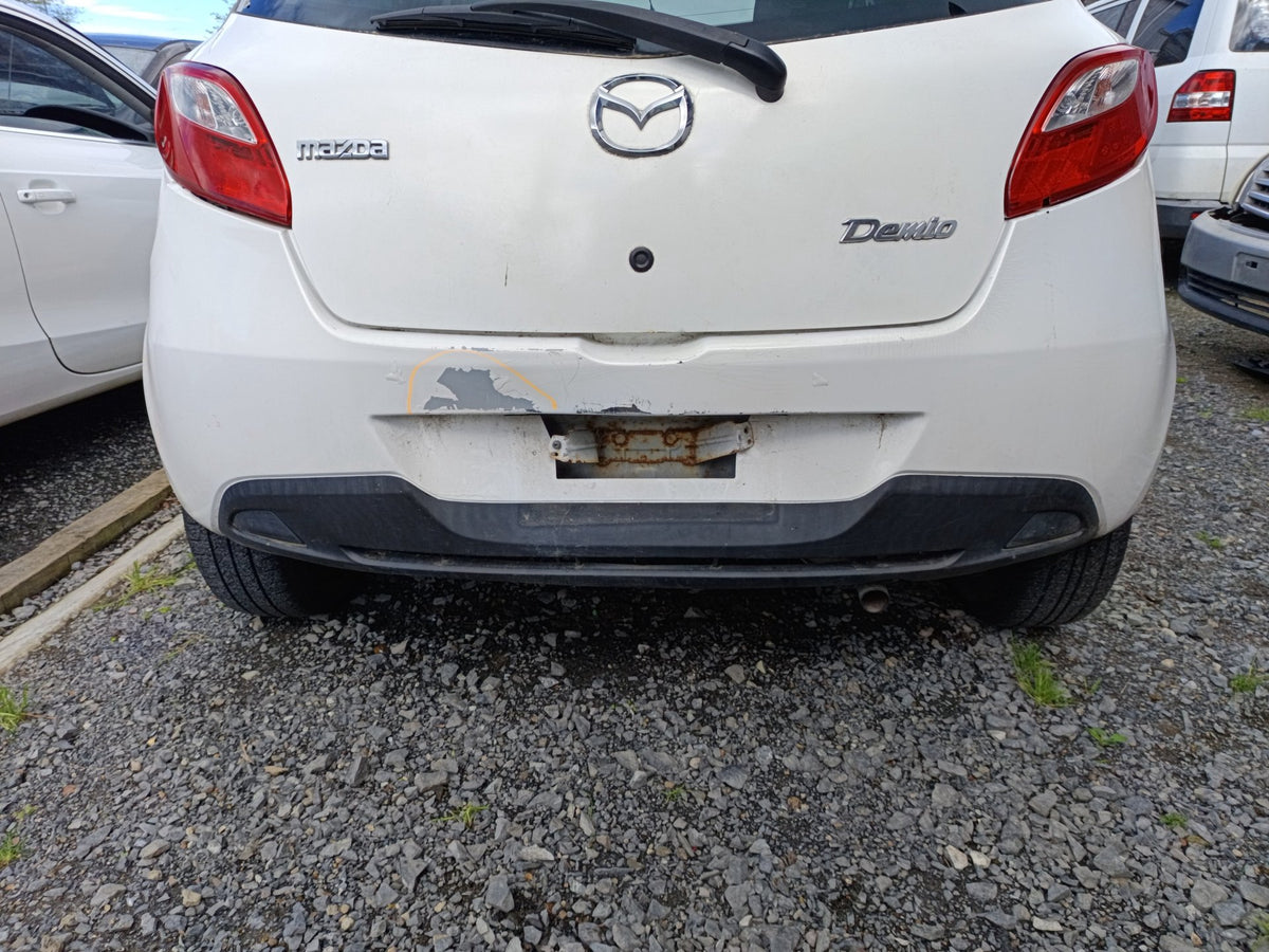 2011 Mazda Demio DE - Rear Bumper PN: