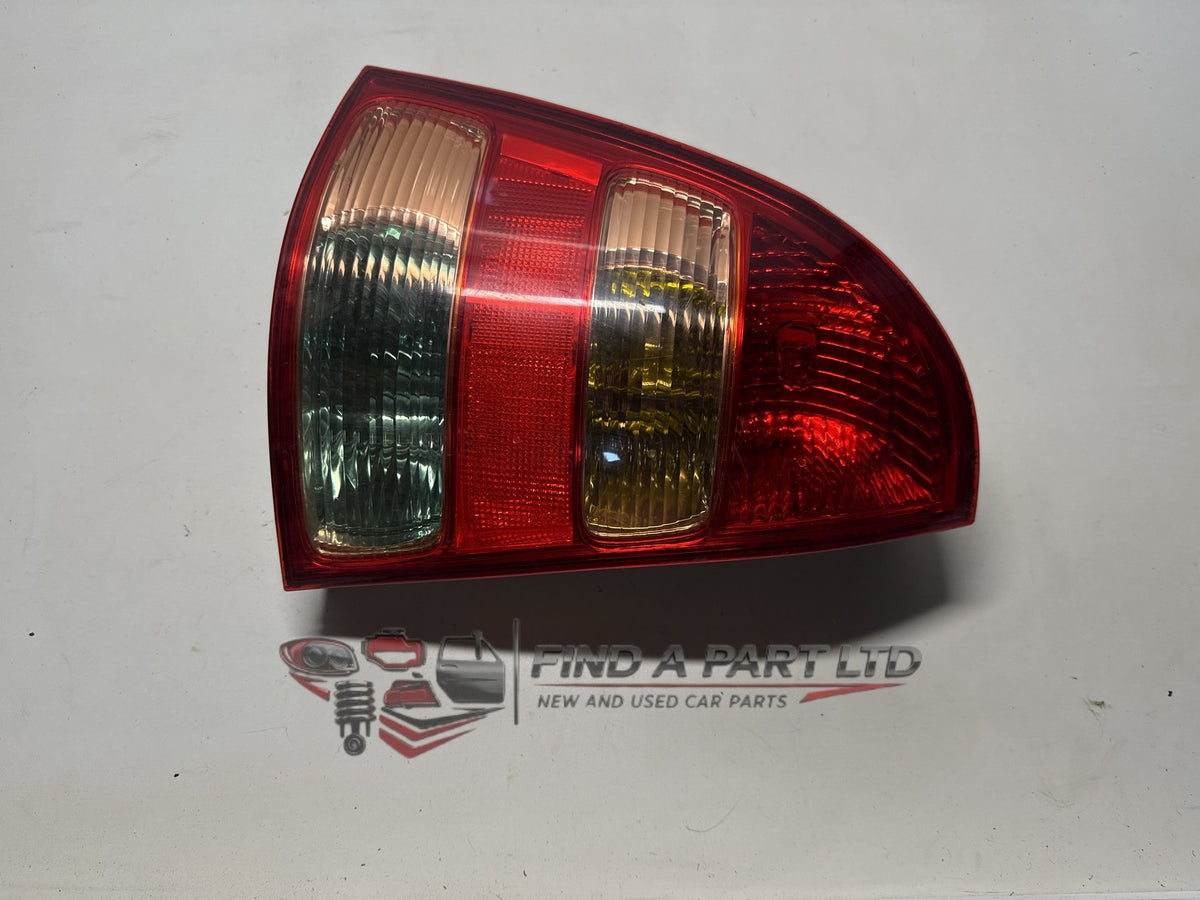 2004 Toyota Corolla E120 - Left Taillight PN: 13 79